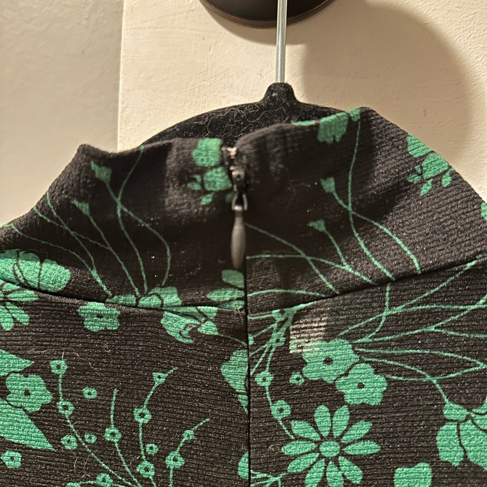 Long sleeve green floral and black top neck and puff sleeves